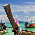 slides/IMG_8060_1.jpg koh phi phi don, island, longtail, boat, decoration, traditional, flower, sea, resort, sky, cloud, colour, krabi, province, thailand SEAT4 - Longtail Boat, Phi Phi Don Island